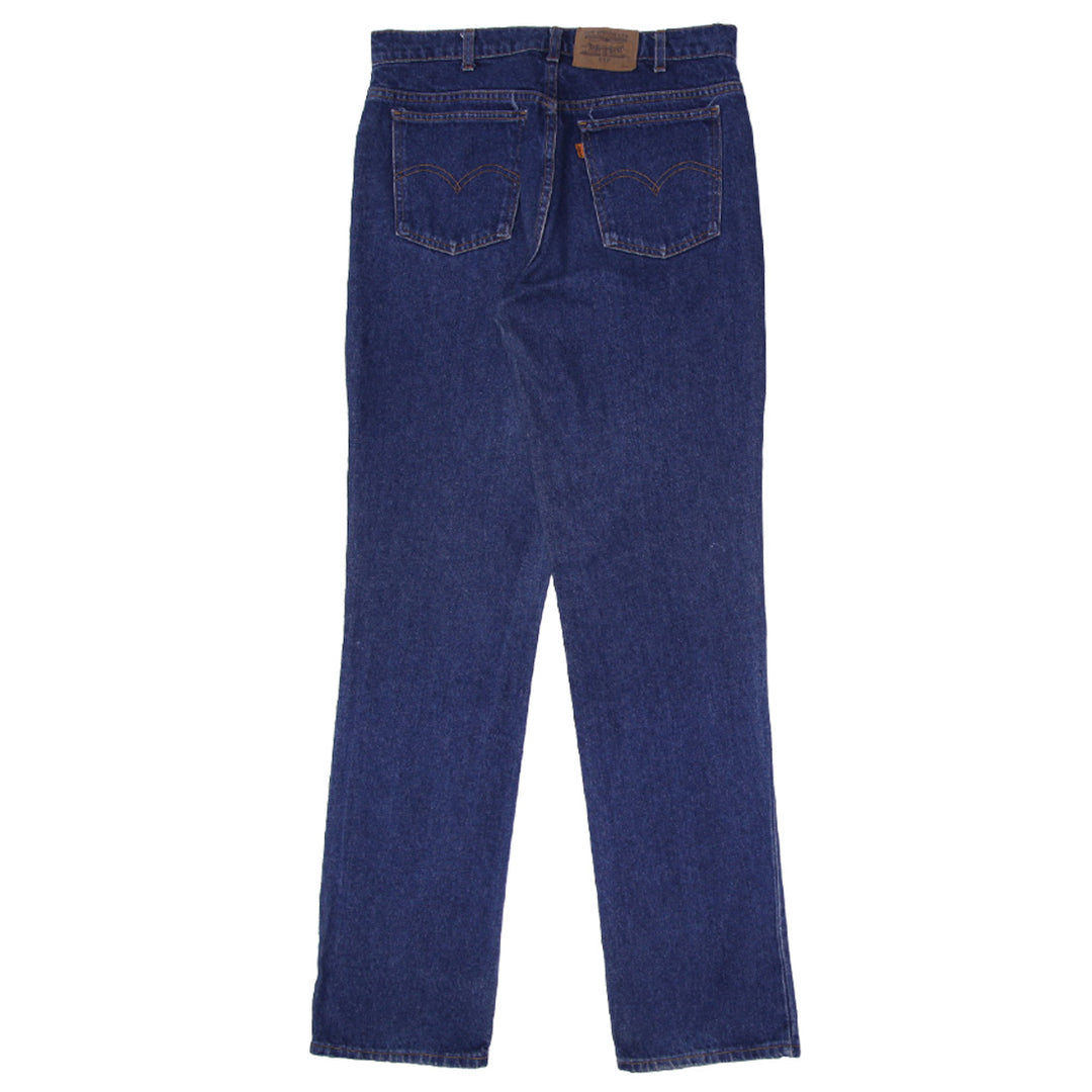 Vintage Levis 619 Orange Tab Jeans | Migration_Pants UAENAT20 - Side View | Fashion Rerun