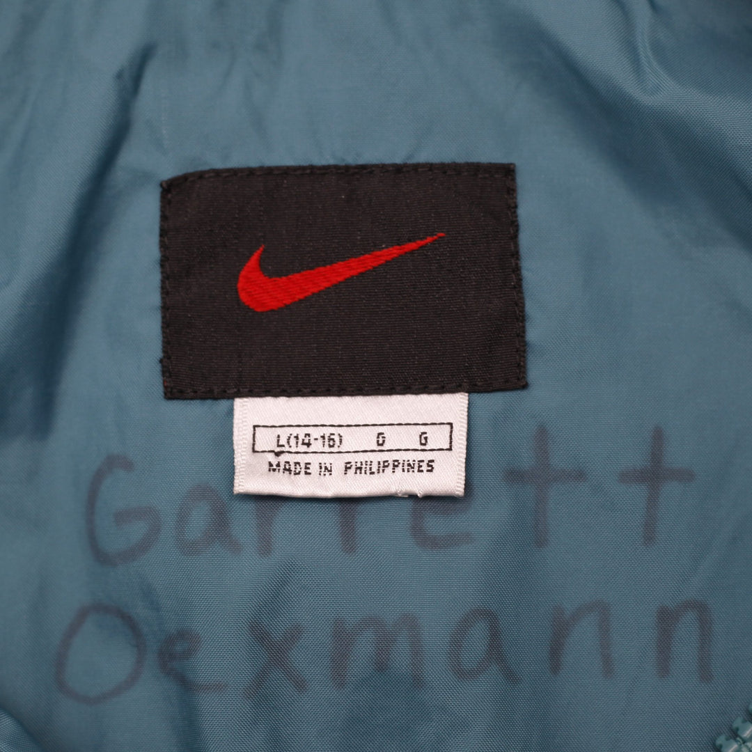 Vintage Nike Hooded Windbreaker Jacket Size L | Migration_Jackets - Back View | Fashion Rerun