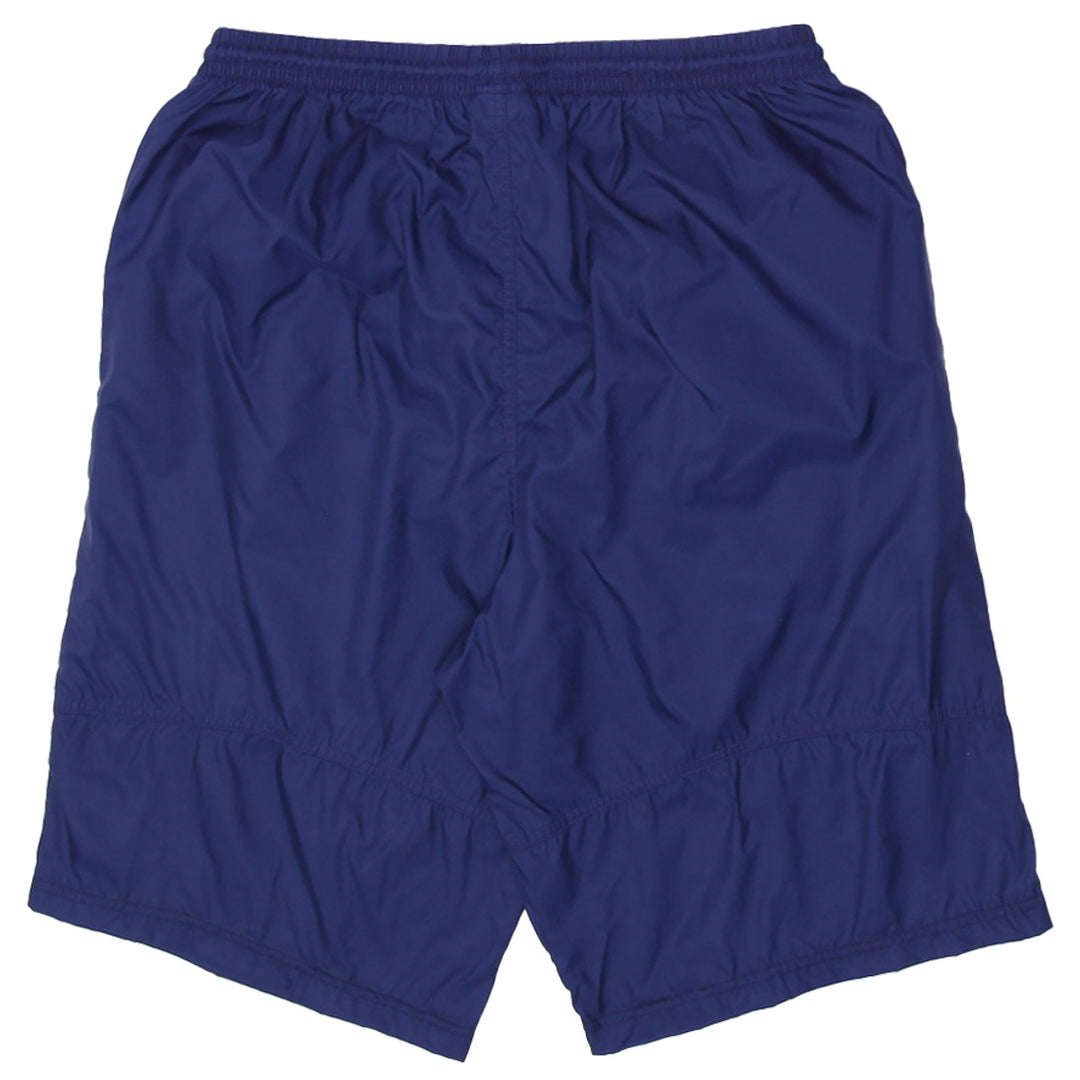 Vintage Nike Embroidered Logo Nylon Shorts | Migration_Shorts JUNEEID20% Nike Shorts - Side View | Fashion Rerun
