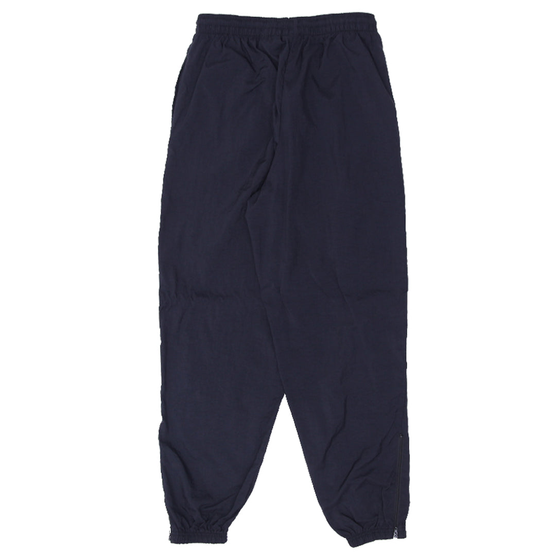 90s Vintage Nike Swoosh Embroidered Nylon Cuffed Track Pants Youth - Fashion Rerun Vintage Migration_Pants