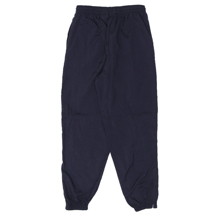 90s Vintage Nike Swoosh Embroidered Nylon Cuffed Track Pants Youth - Fashion Rerun Vintage Migration_Pants