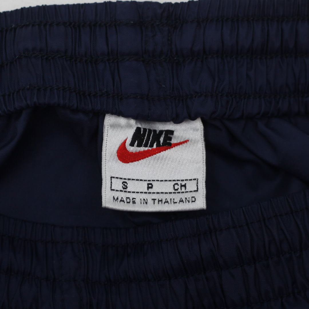 Vintage 90's Nike Swoosh Embroidered Nylon Track Pants Navy Size S - Fashion Rerun Vintage Migration_Pants