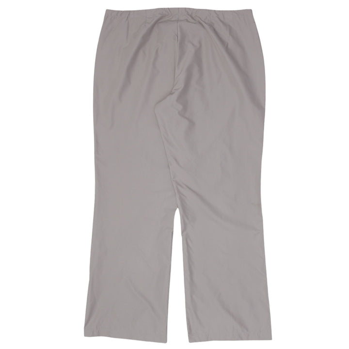 Vintage Nike Ladies Front Zip Wide Leg Track Pants featuring sporty design and retro athletic style