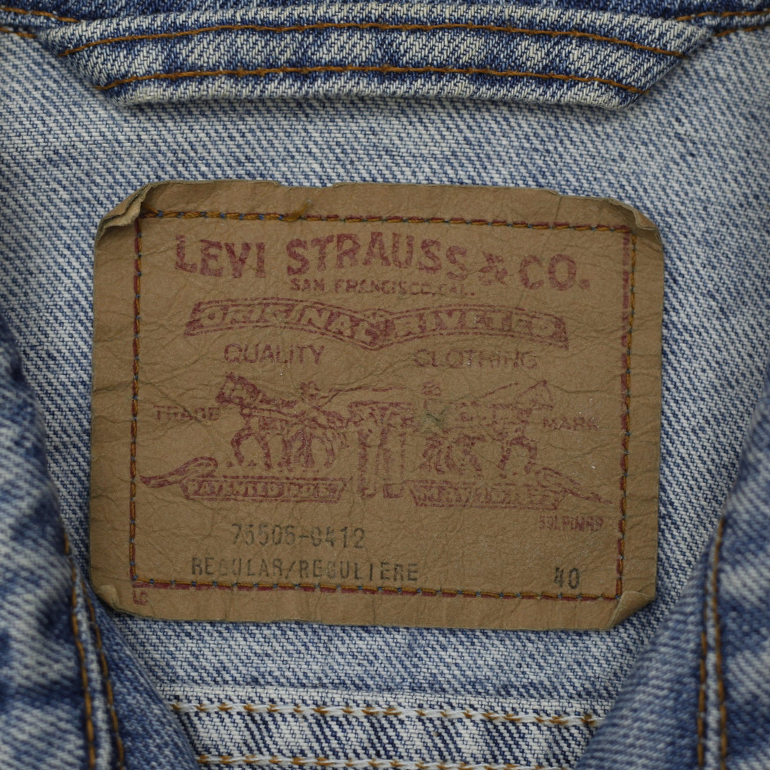 Vintage 75506-0412 Levi's Denim Trucker Jacket Washed Blue Size 40 | Migration_Jackets - Back View | Fashion Rerun