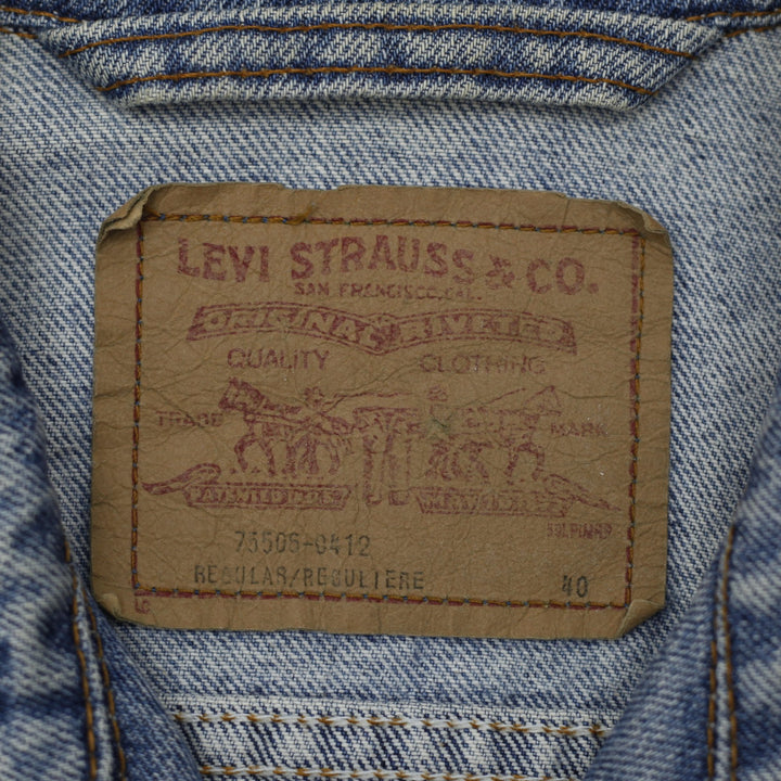 Vintage 75506-0412 Levi's Denim Trucker Jacket Washed Blue Size 40 | Migration_Jackets - Back View | Fashion Rerun