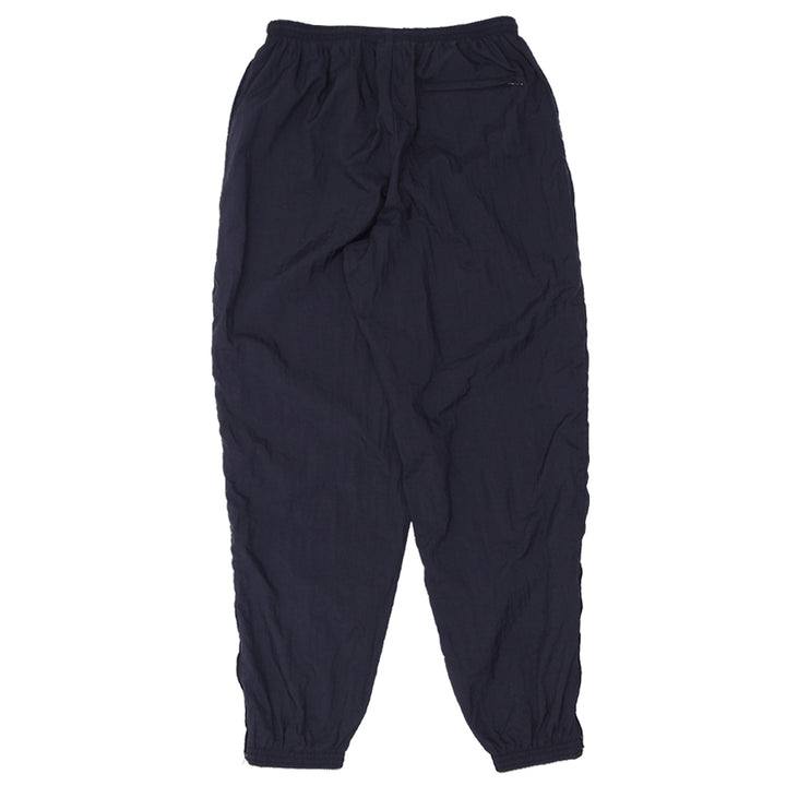 90's Vintage Nike Nylon Cuffed Track Pants - Fashion Rerun Vintage Migration_Pants