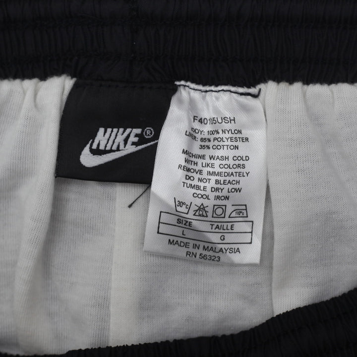 Vintage Nike Embroidered Cuffed Nylon Track Pants Black - Fashion Rerun Vintage Migration_Pants