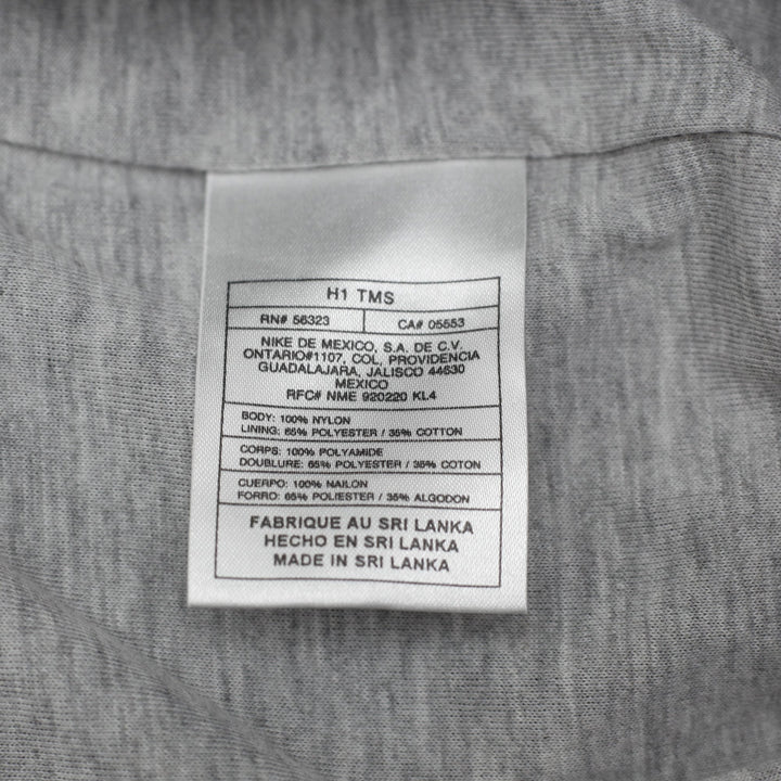Vintage Mens 00s Nike Navy Nylon Track Pants Size L | Migration_Pants - Detail View | Fashion Rerun