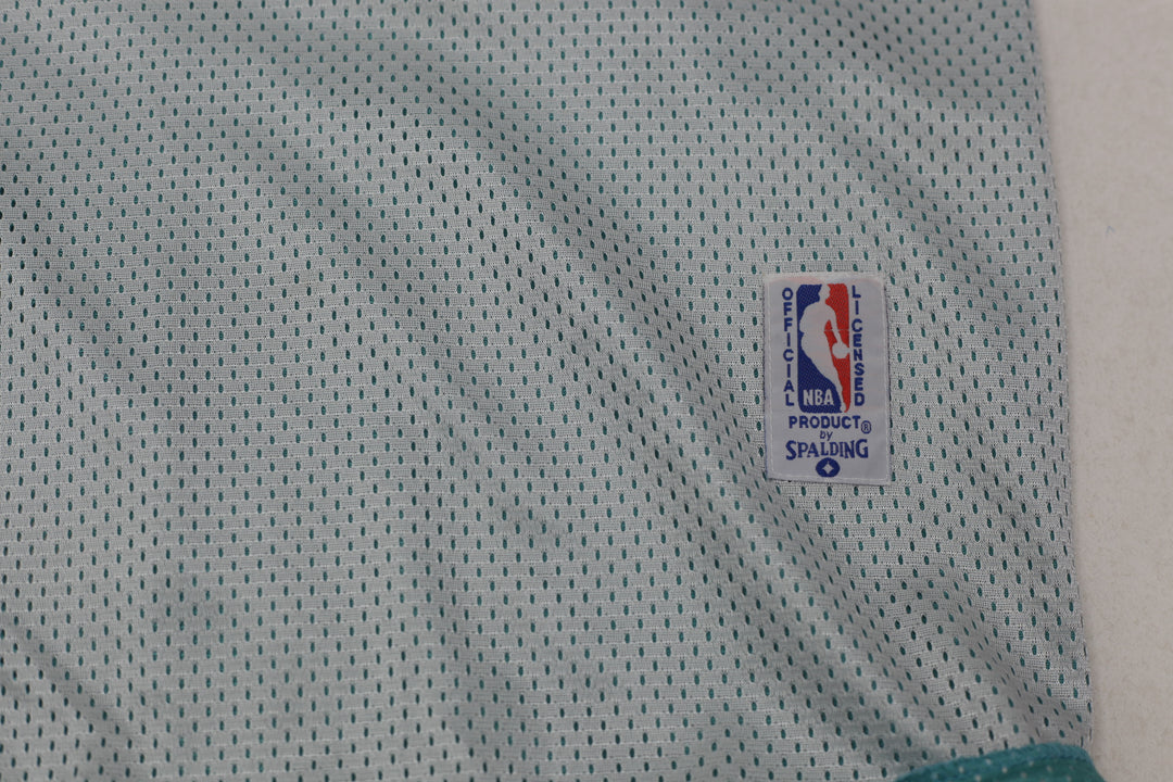 Vintage NBA Spalding Charlotte Hornetts 23 Reversible Basketball Jersey XXL - Fashion Rerun Vintage Migration_Jersey