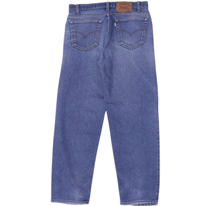 Vintage Levi's Washed Blue Crazy Denim Jeans | Migration_Jeans - Side View | Fashion Rerun