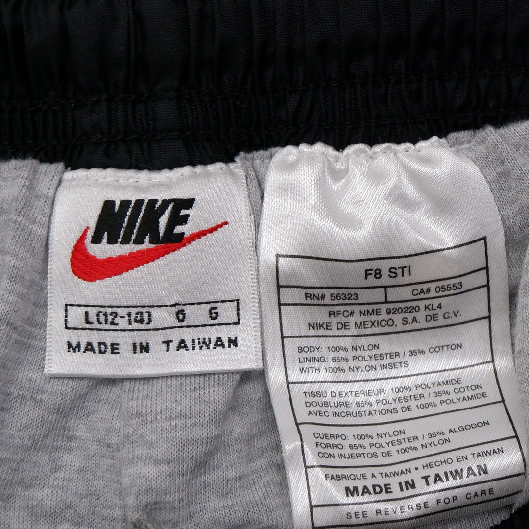 Vintage Ladies Embroidered Nike Logo Black Nylon Sports Pants