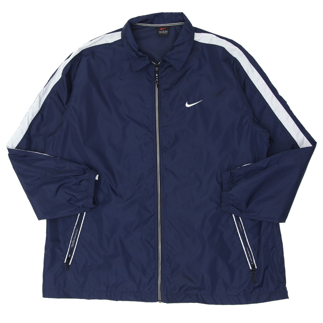 Nike Windbreaker layered with modern accessories