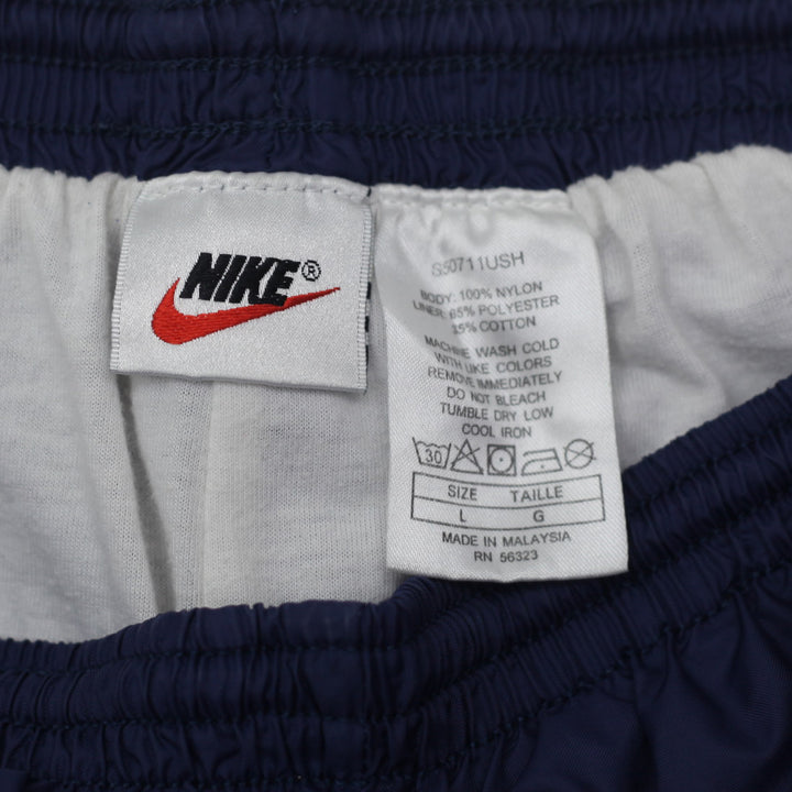 Vintage 90's Nike Embroidered Nylon Cuff Track Pants Size L - Fashion Rerun Vintage Migration_Pants