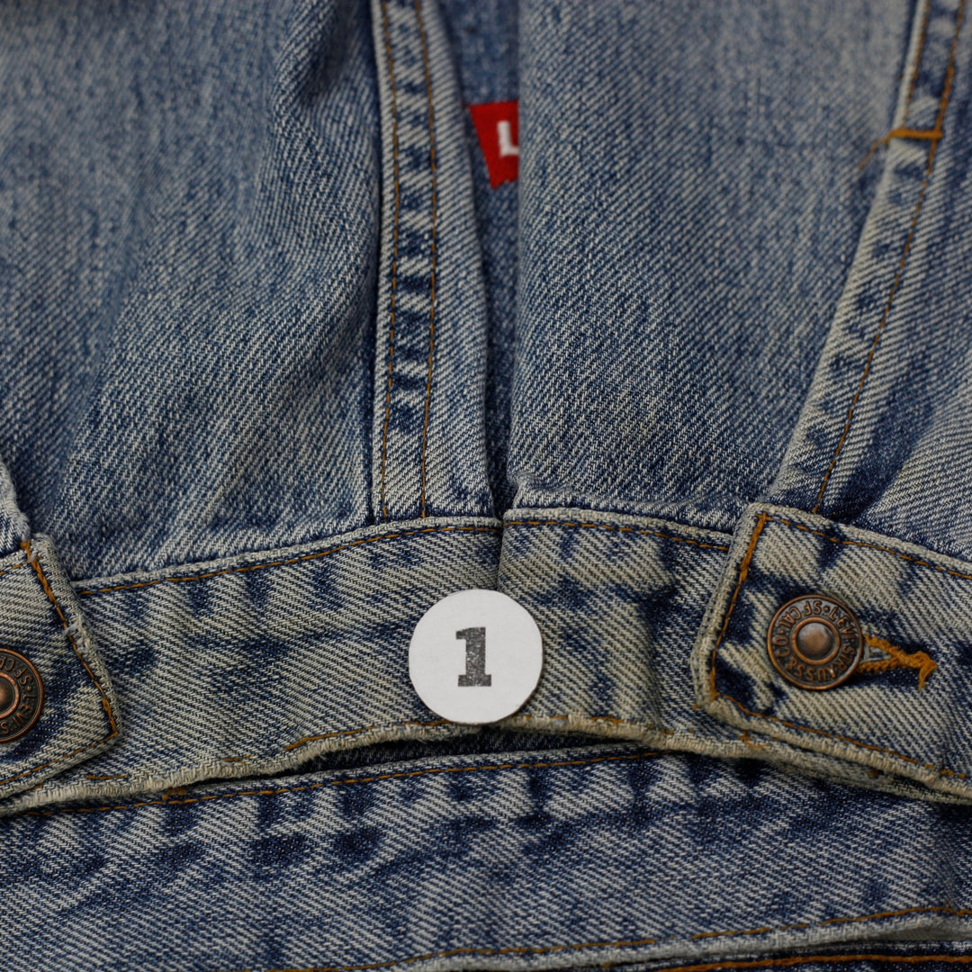 Vintage Levis Trucker Jacket Washed Blue Denim PolyGram Graphic
