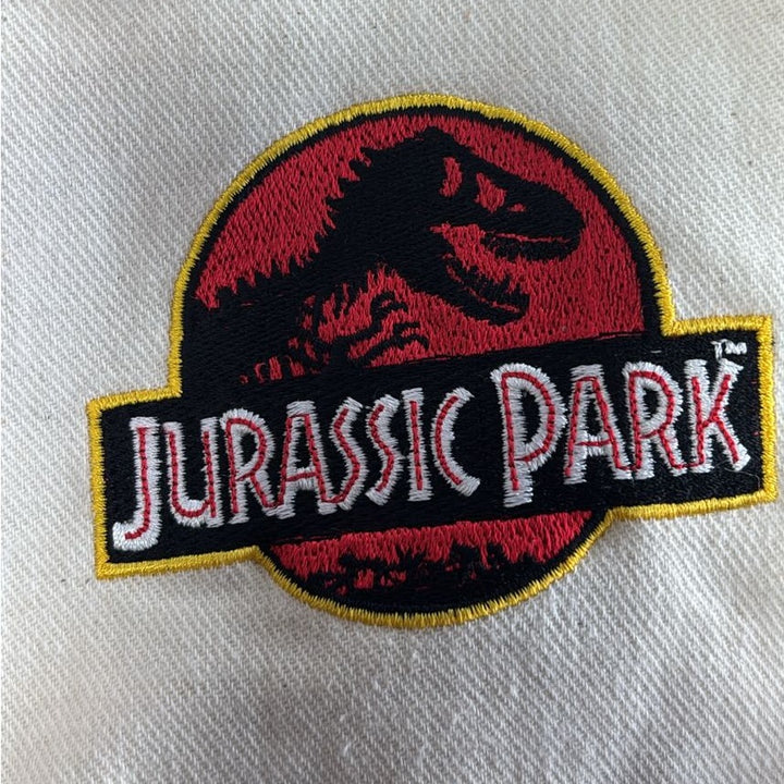 Vintage Jurassic Park 90s Universal Dinosaurs Jacket Made In USA Size XL | Migration_Jackets - Detail View | Fashion Rerun