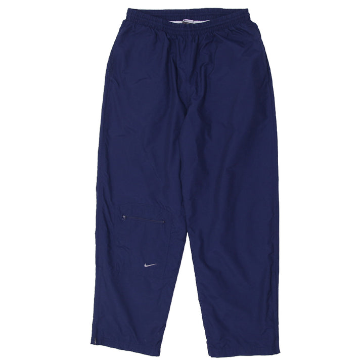 Vintage Nike nylon track pants with embroidered logo