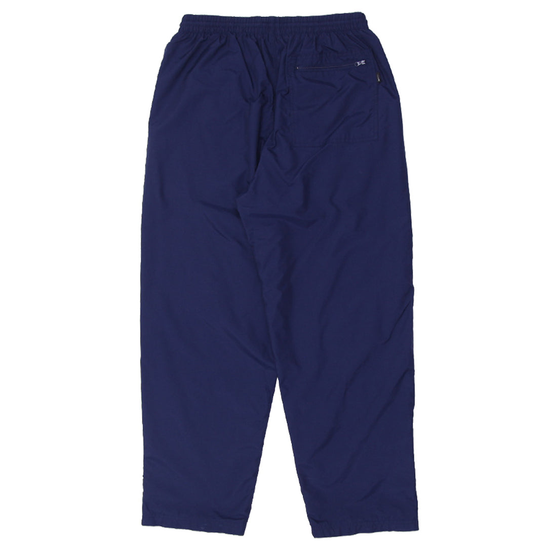 Vintage Nike nylon track pants with embroidered logo