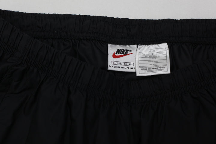 Vintage 90's Nike Black Nylon Ankle Zip Track Pants- Size XL , Youth - Fashion Rerun Vintage Migration_Pants