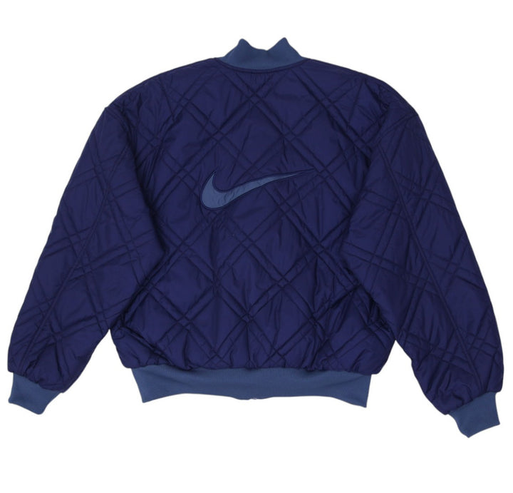 Vintage Nike Puffer Navy Quilted Full Zip Reversible Swoosh Jacket Size M | Migration_Jackets - Side View | Fashion Rerun