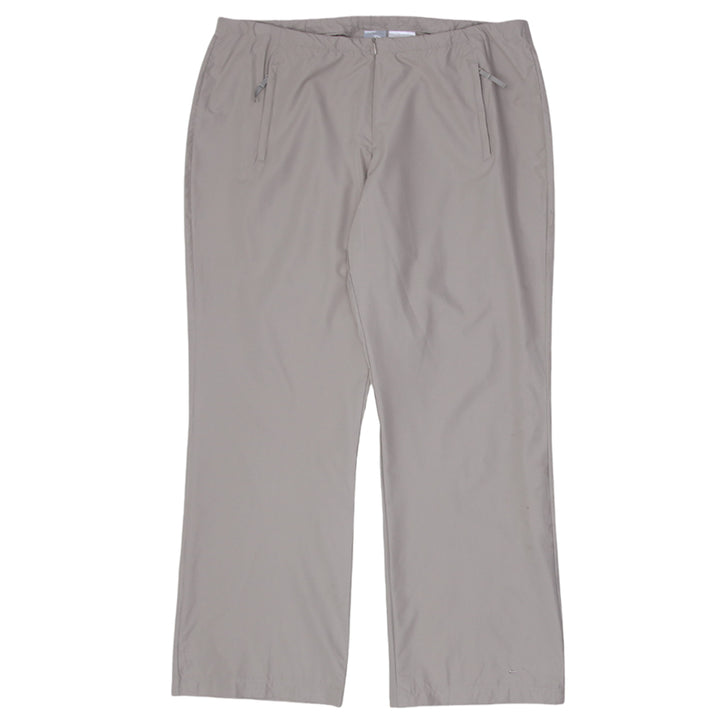 Vintage Nike Ladies Front Zip Wide Leg Track Pants featuring sporty design and retro athletic style