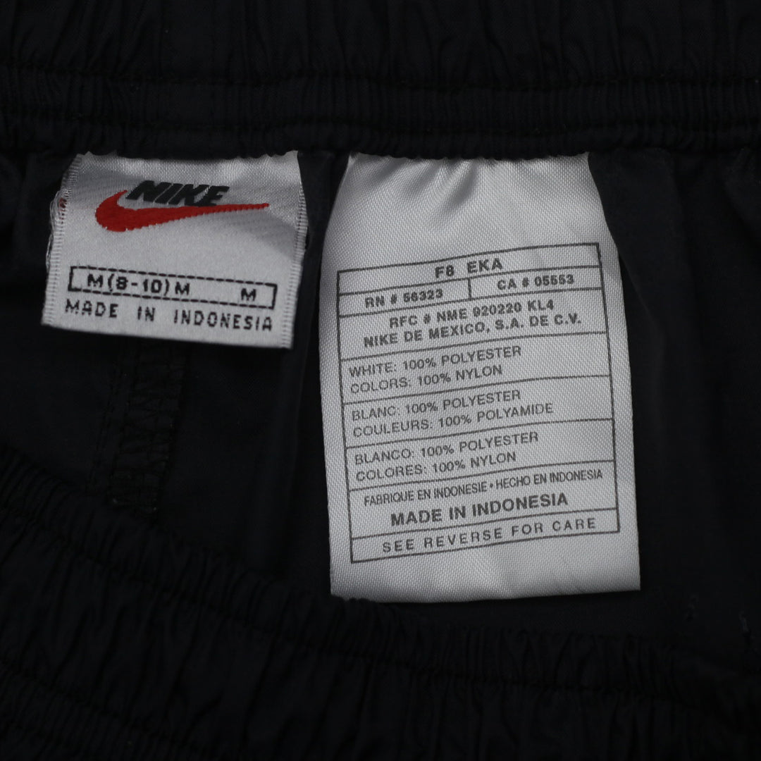 Vintage 90's Nike Black Nylon Track Pants Youth Size M - Fashion Rerun Vintage Migration_Pants