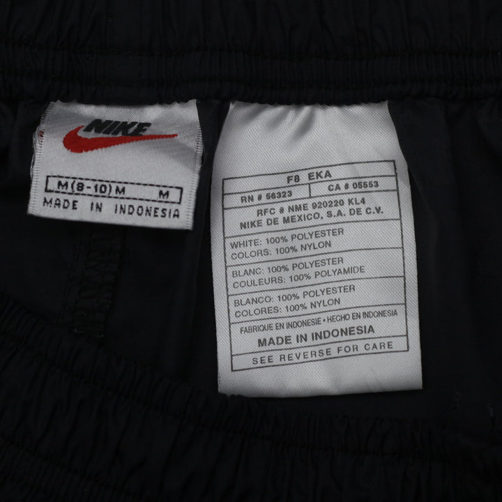 Vintage 90's Nike Black Nylon Track Pants Youth Size M - Fashion Rerun Vintage Migration_Pants