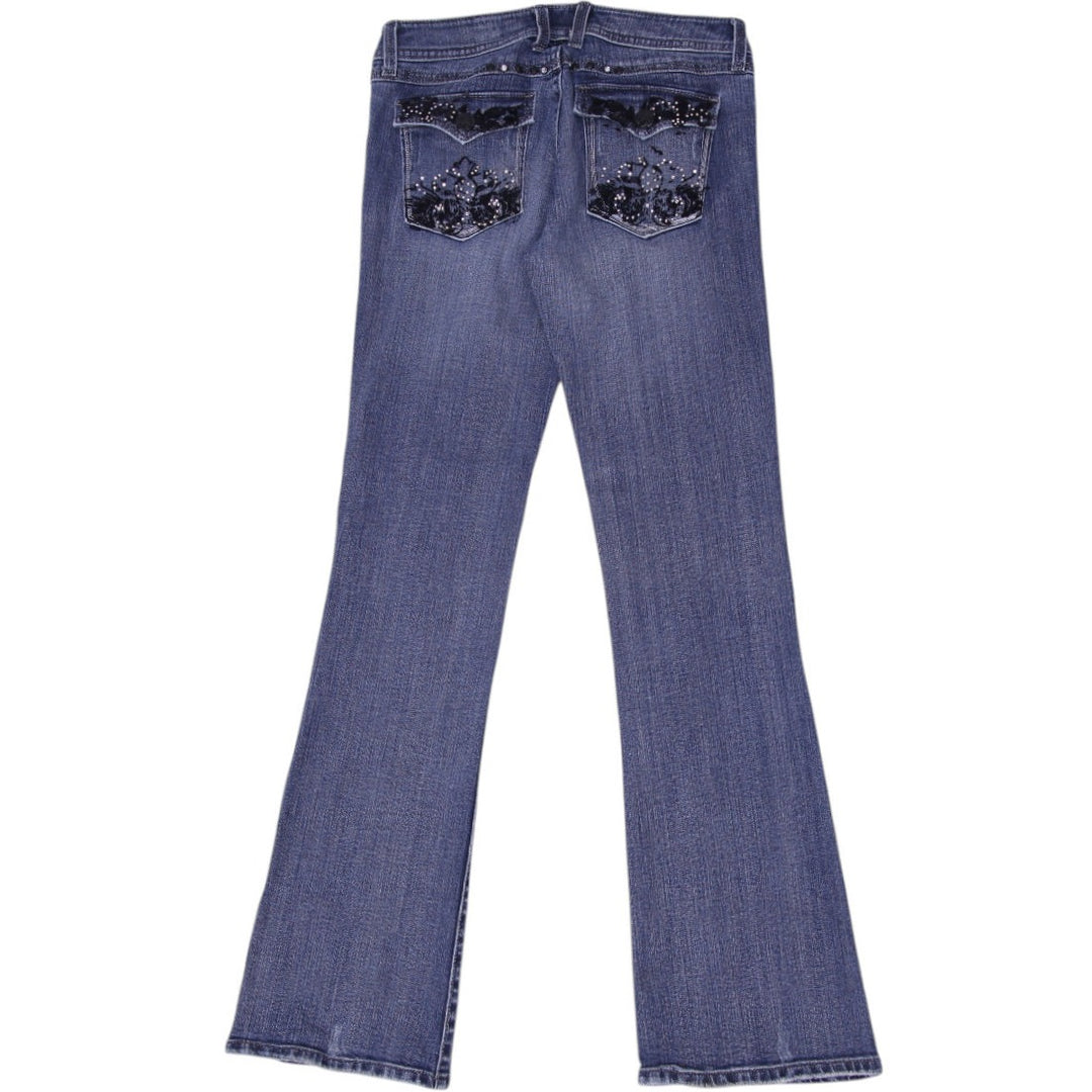 Y2K Womens Rock By Wrangler Ultra Low Rise Flare Jeans | Migration_Jeans & Pants - Side View | Fashion Rerun