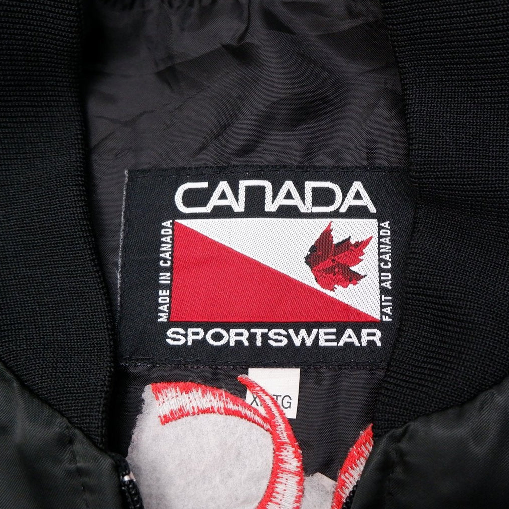 Vintage Mens Canada Sportswear Bomber Jacket Black Embroidered Patches | Migration_Jacket UAENAT20 - Back Vie | Fashion Rerun