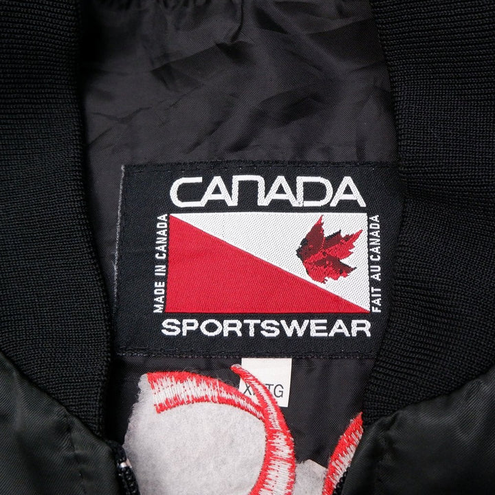 Vintage Mens Canada Sportswear Bomber Jacket Black Embroidered Patches | Migration_Jacket UAENAT20 - Back Vie | Fashion Rerun