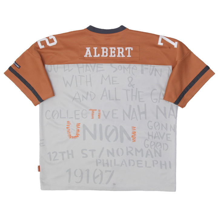 Vintage Platinum Fubu Fat Albert Football Shirt Orange Beige | Migration_Jerseys UAENAT20 - Side View | Fashion Rerun
