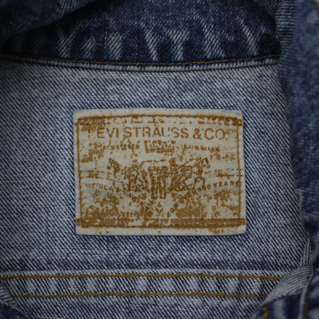 Vintage Levis Trucker Jacket Washed Blue Denim PolyGram Graphic