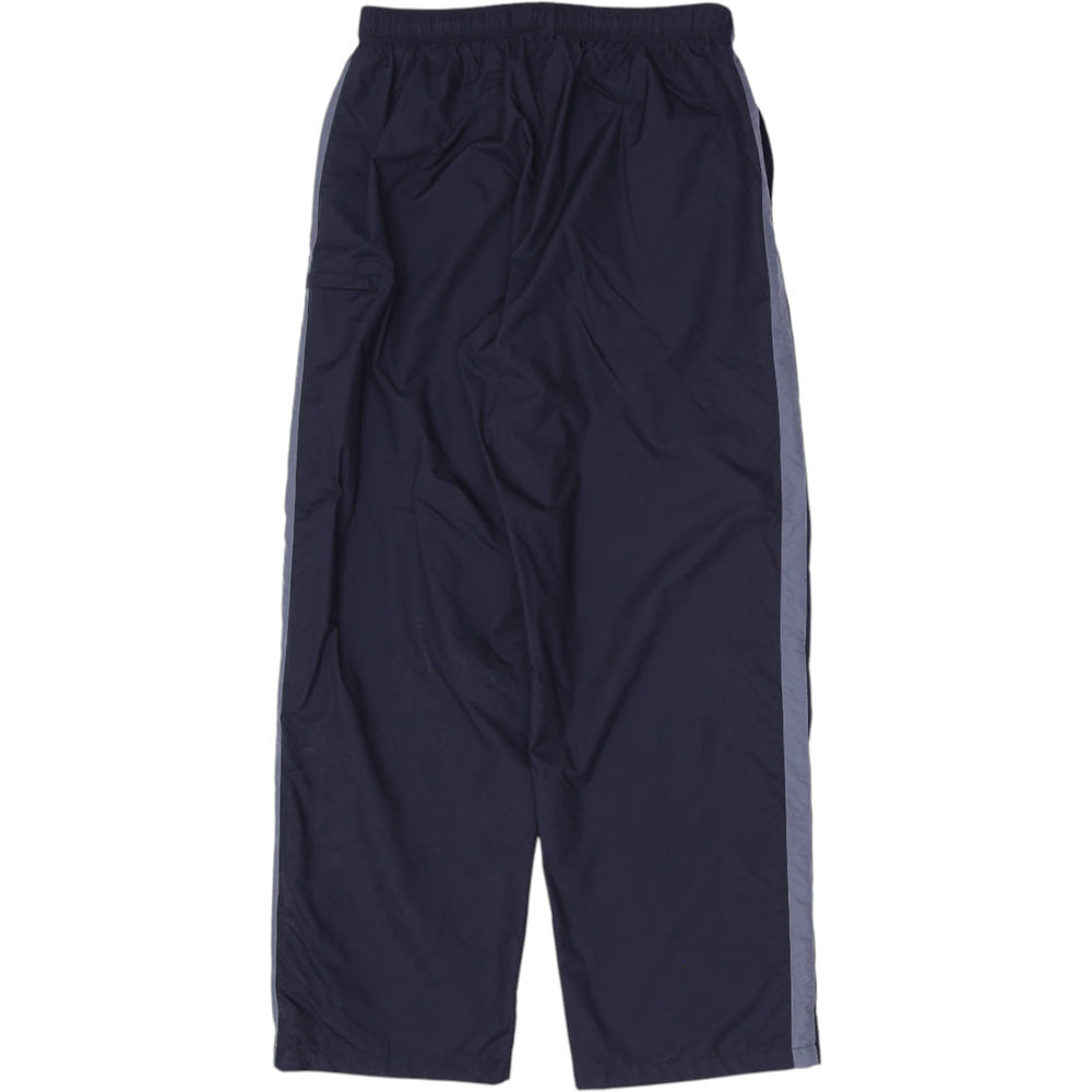 Vintage Mens 00s Nike Navy Nylon Track Pants Size L | Migration_Pants - Side View | Fashion Rerun