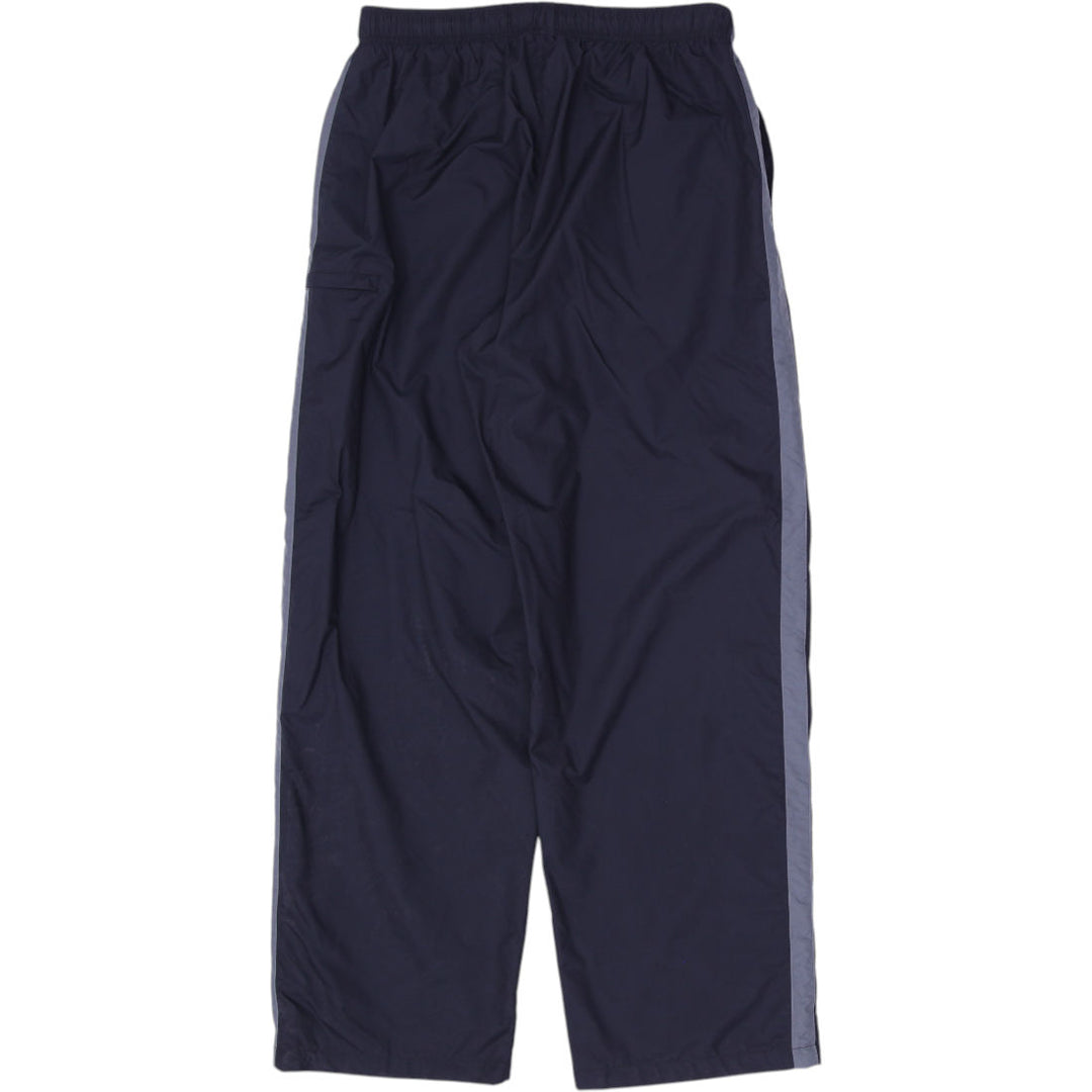 Vintage Mens 00s Nike Navy Nylon Track Pants Size L | Migration_Pants - Side View | Fashion Rerun