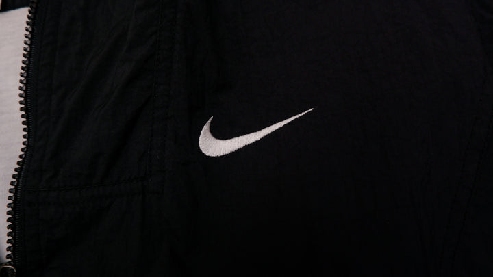 Vintage Ladies 90s Embroidered Nike Logo Windbreaker Zipper Jacket | Migration_Jackets UAENAT20 - Detail View | Fashion Rerun
