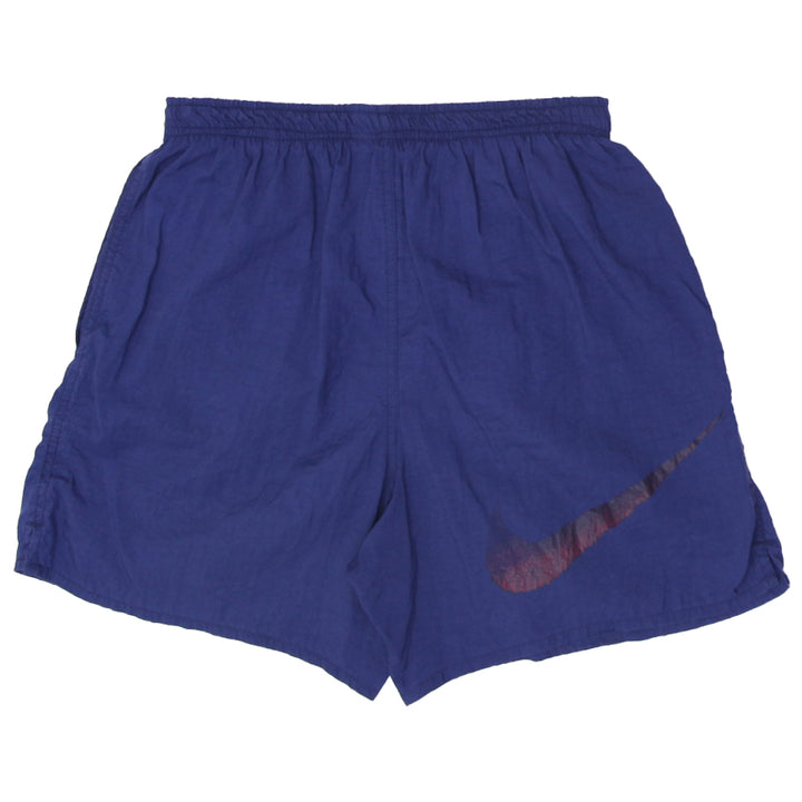 Vintage Nike Swim Shorts Navy Blue Nylon Maroon Swoosh Lines | Migration_Shorts UAENAT20 - Side View | Fashion Rerun