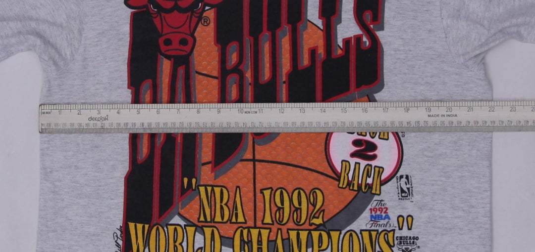 Vintage 1992 Chicago Bulls "Back 2 Back" NBA World Champions T-Shirt | Migration_T-Shirts - View 9 | Fashion Rerun