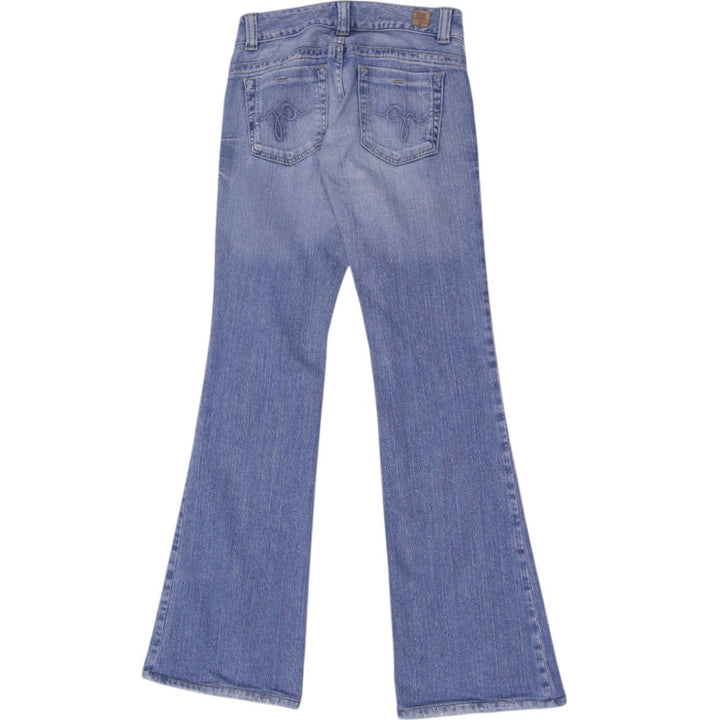 Y2K Ladies Guess Flare Jeans Light Blue Denim Jeans Size 23 | Migration_Jeans & Pants - Side View | Fashion Rerun