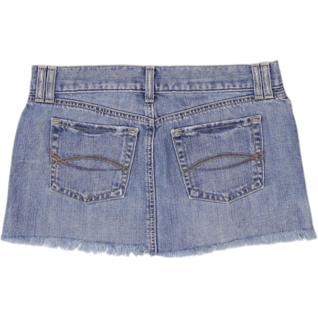 Y2K Ladies Distressed Frayed Hem Blue Denim Mini Skirt Size 2 | Migration_Skirts - Side View | Fashion Rerun