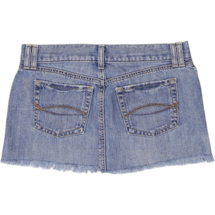 Y2K Ladies Distressed Frayed Hem Blue Denim Mini Skirt Size 2 | Migration_Skirts - Side View | Fashion Rerun