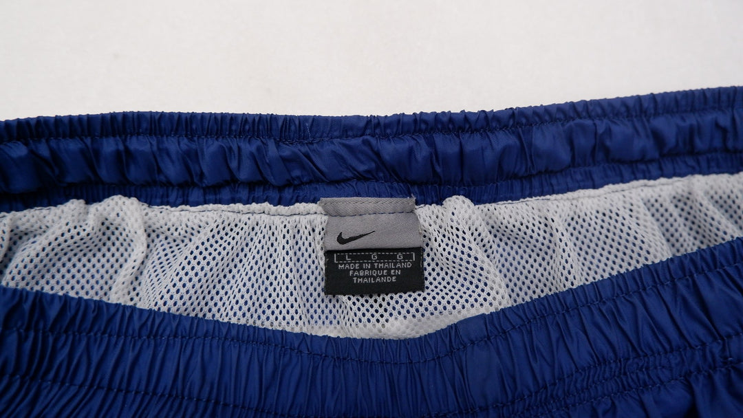 Vintage Mens Nike Sports Shorts Navy Blue Spellout Logo | Migration_Shorts UAENAT20 - Back View | Fashion Rerun