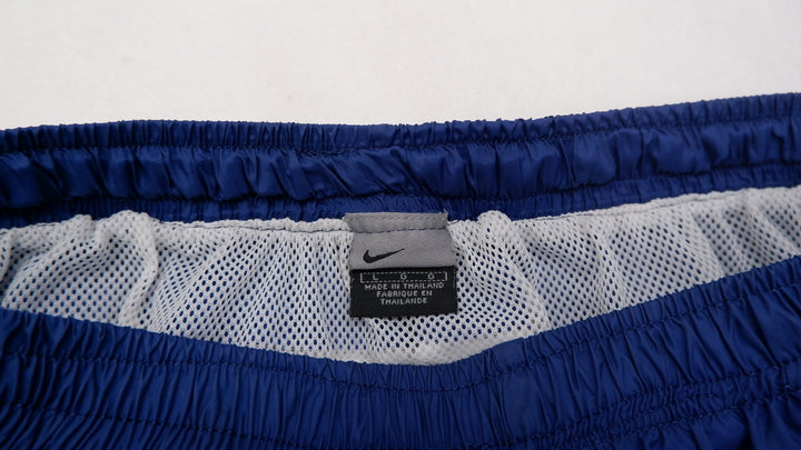 Vintage Mens Nike Sports Shorts Navy Blue Spellout Logo | Migration_Shorts UAENAT20 - Back View | Fashion Rerun