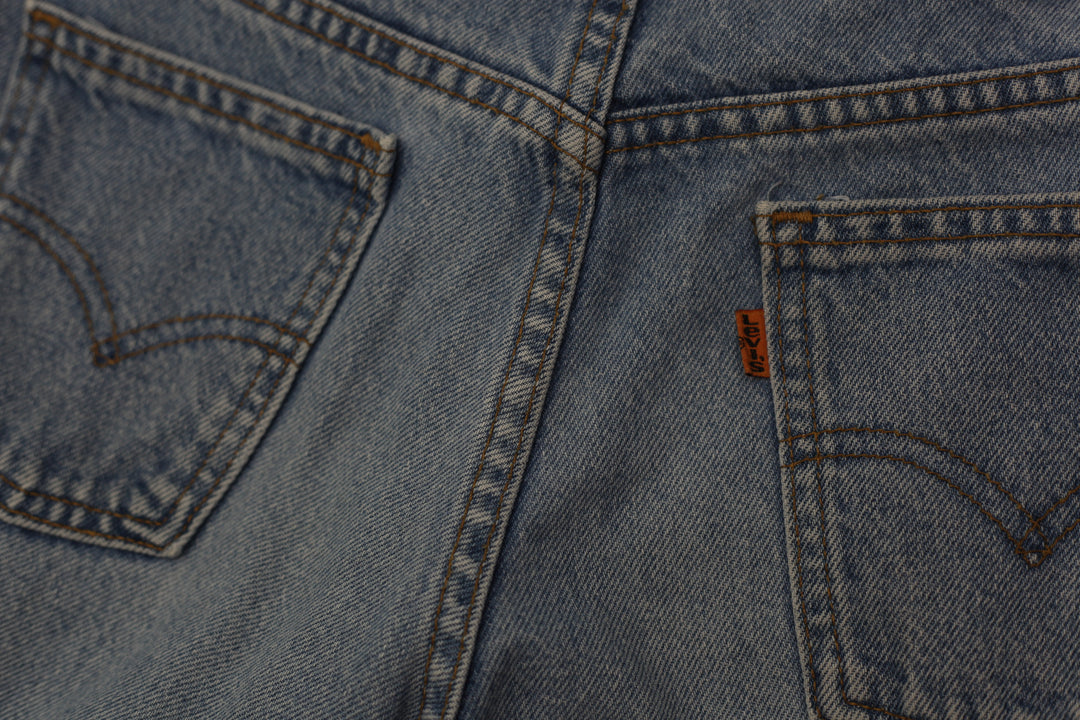 Vintage Levis 665 High Waisted Orange Tab Jeans