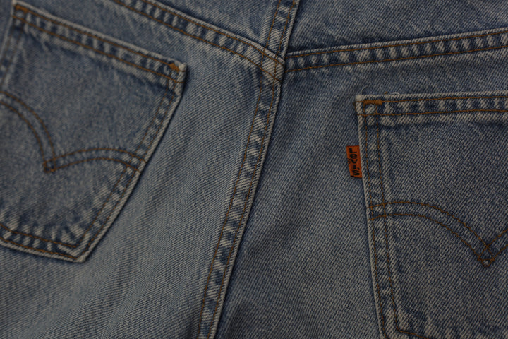 Vintage Levis 665 High Waisted Orange Tab Jeans