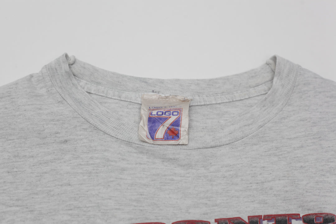 1994 Vintage NBA Toronto Raptors T-Shirt Single Stitch Logo 7 | Migration_T-Shirts UAENAT40 - Back View | Fashion Rerun