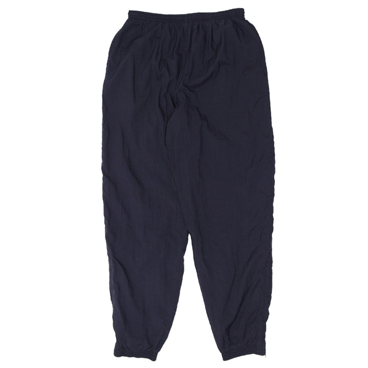 90's Vintage Nike Nylon Cuffed Track Pants - Fashion Rerun Vintage Migration_Pants