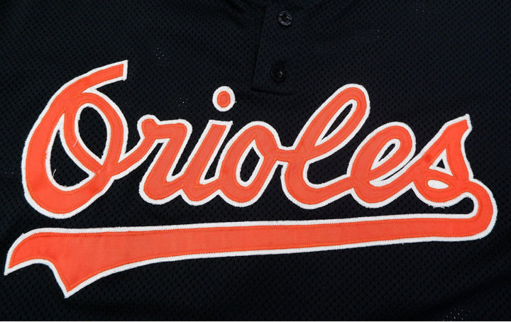 Vintage Russell Athletic Orioles Black Mesh Baseball Jersey Made In USA | Migration_Jerseys - Detail View | Fashion Rerun