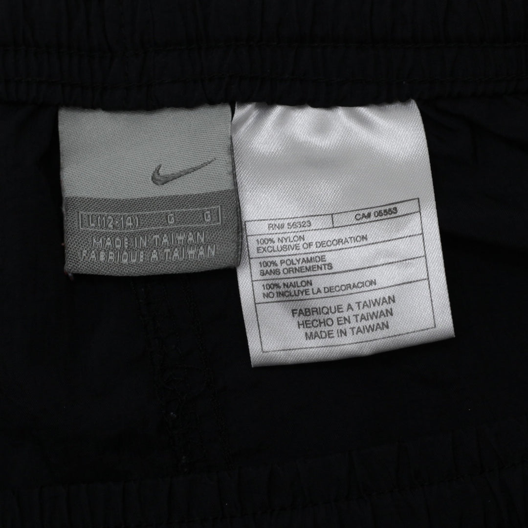 Vintage Ladies Embroidered Nike Black Nylon Sports Shorts | Migration_Shorts - Back View | Fashion Rerun