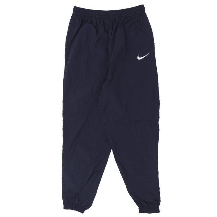 90s Vintage Nike Swoosh Embroidered Nylon Cuffed Track Pants Youth - Fashion Rerun Vintage Migration_Pants